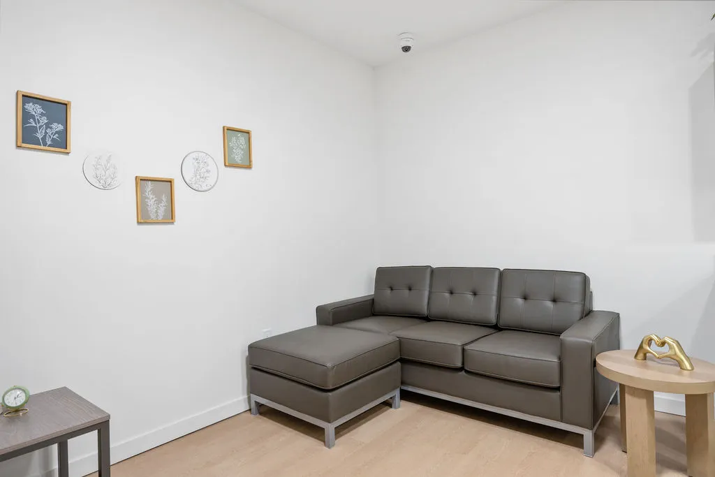 couch in studio Syracuse apartments